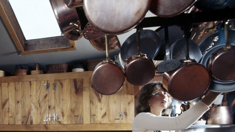 Ceiling-mounted pot holder in Martha Stewart's 1970's kitchen