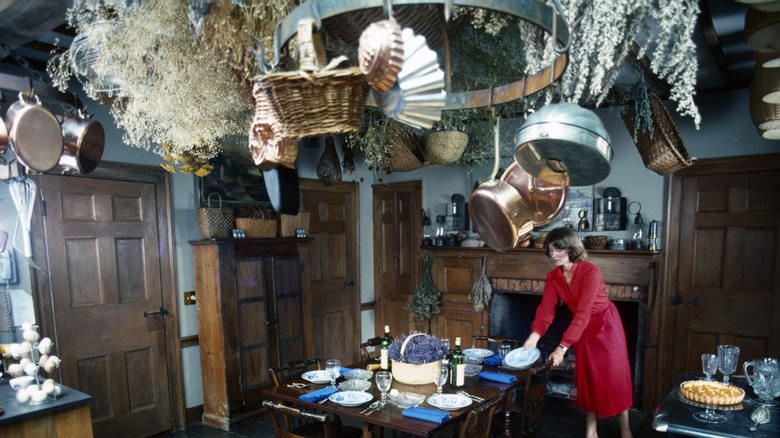 Martha Stewart setting dining table in her 1970s home