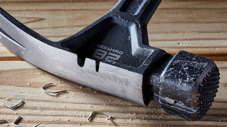 Close-up of the metal head on DeWalt's 28 ounce Steel Framing Hammer