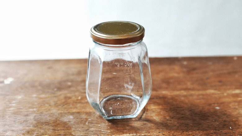 Hexagonal glass jar on table