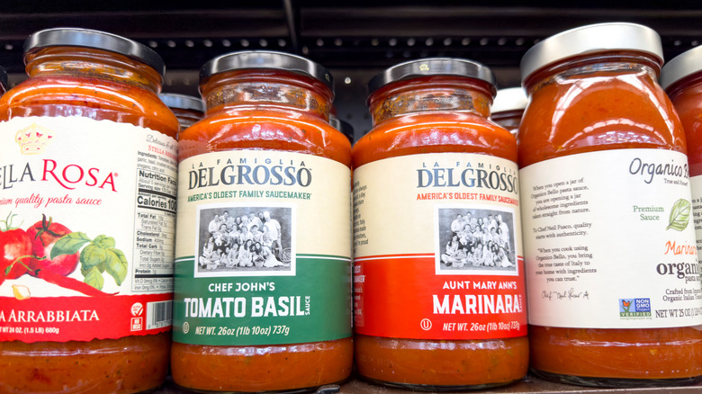 Pasta sauce jars on store shelf