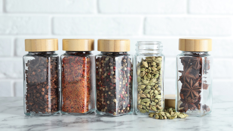 Spice jars with different spices inside