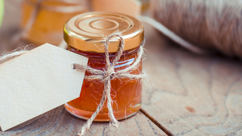 Tiny glass jam jar