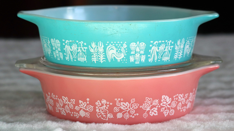 Stack of colorful vintage Pyrex dishes