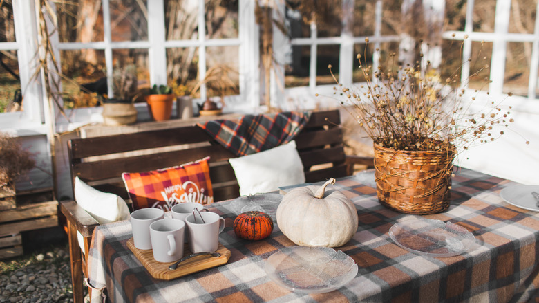 Outdoor setup with fall decor