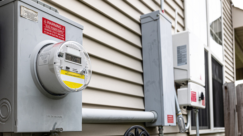 Woman looking shocked after viewing a bill