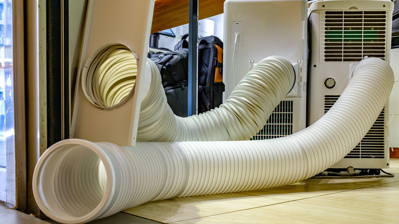 Hoses coming out of portable air conditioners
