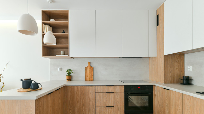 Modern kitchen with neutral off-white and brown colors