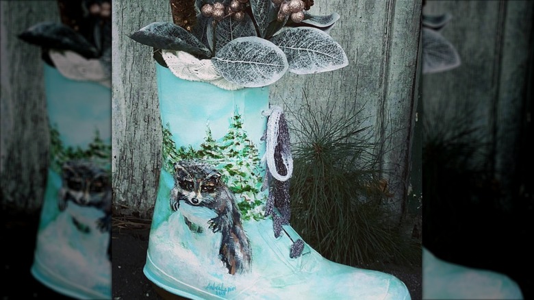 Rain boot painted with woodland scene