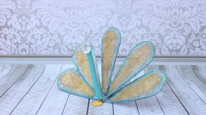 wire whisk peacock sculpture