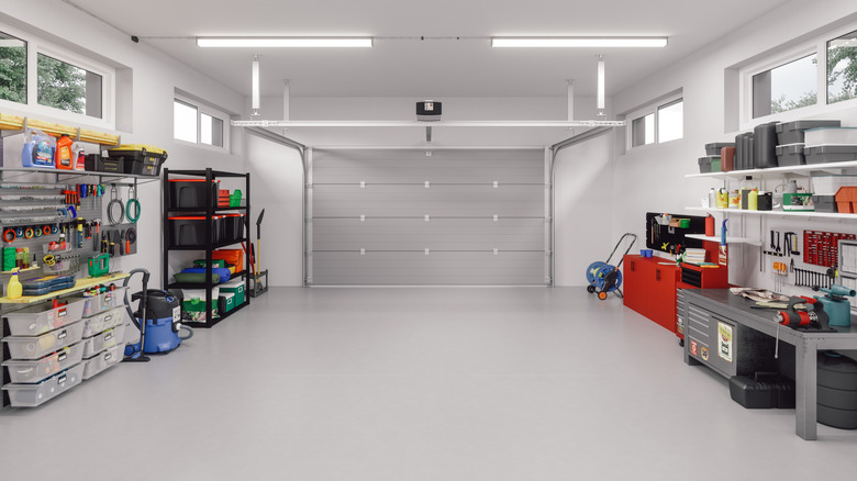 The tidy interior of a garage with nothing on the floor to trip over
