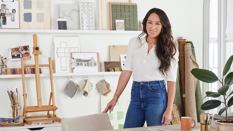 Joanna Gaines posing at desk