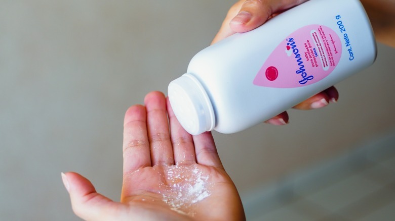 Baby powder sprinkled on hand