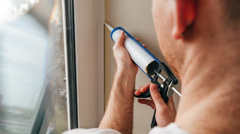 Caulking to seal cracks