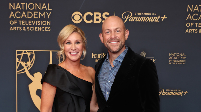 Jenny and Dave Marrs smiling in formalwear.