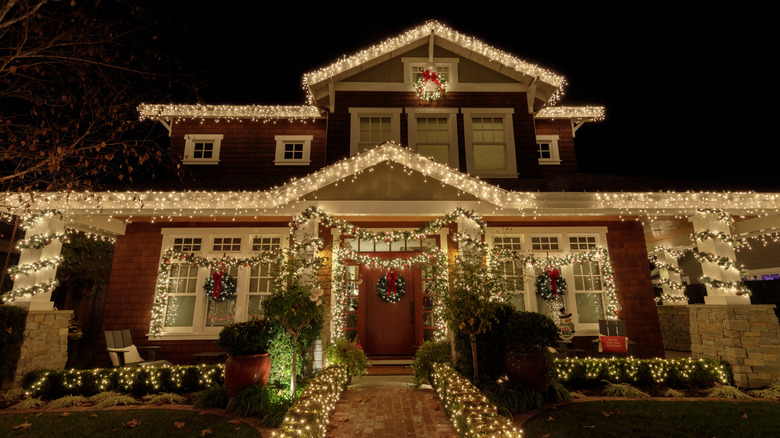 Outside of house decorated with Christmas lights