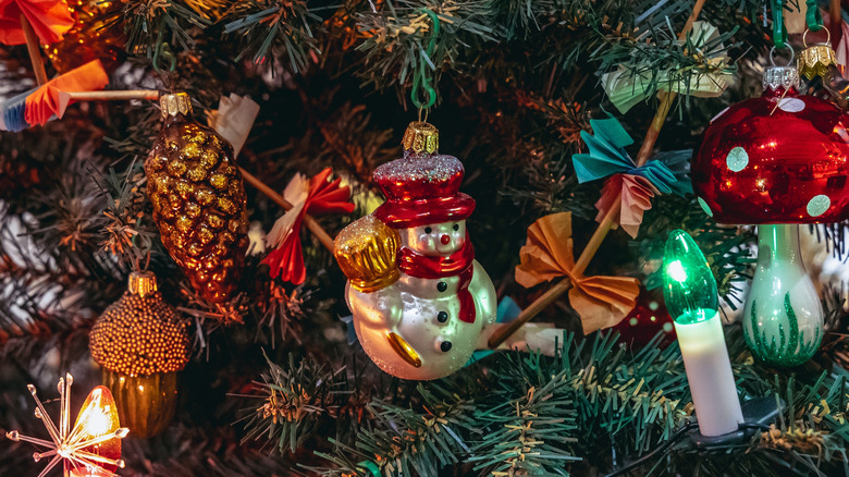 vintage glass snowman ornament on Christmas tree