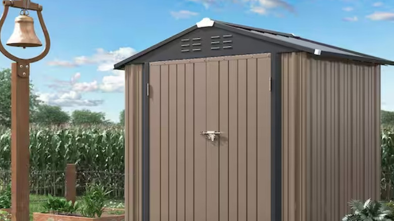 The brown large Tozey shed on a farm.