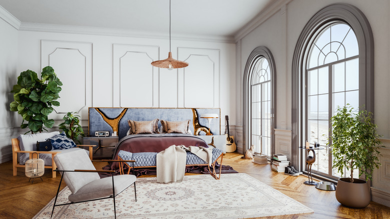 Cozy bedroom with arched windows