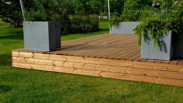 small floating deck in backyard