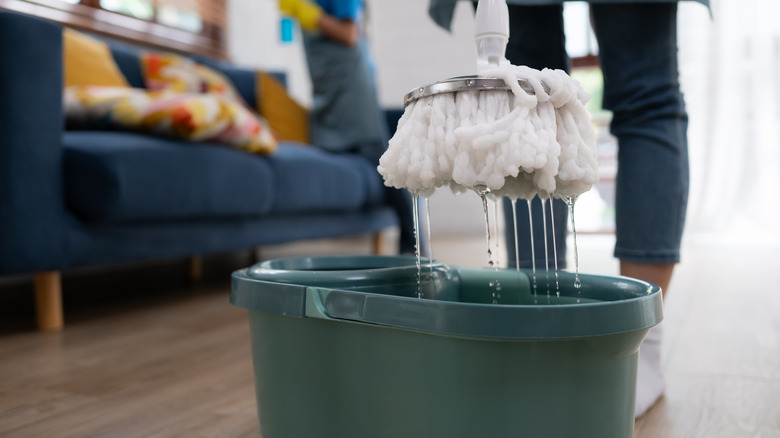Close-up of a mop and bucket