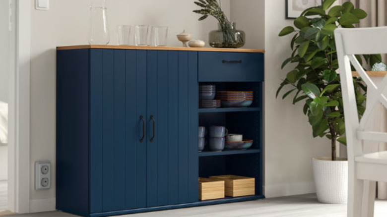 And blue IKEA sideboard is shown in the kitchen