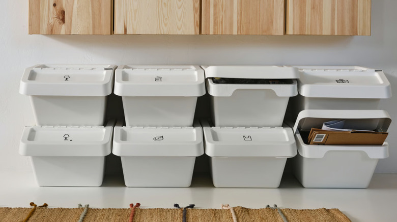 Eight Ikea stackable bins are shown, in two rows of four