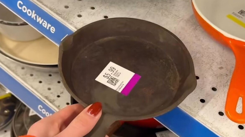 a small cast iron pan at the thrift store with price tag on it