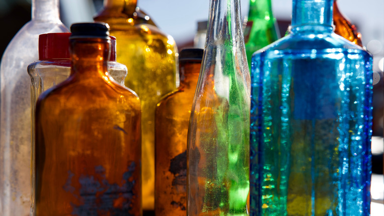 different colored vintage bottles
