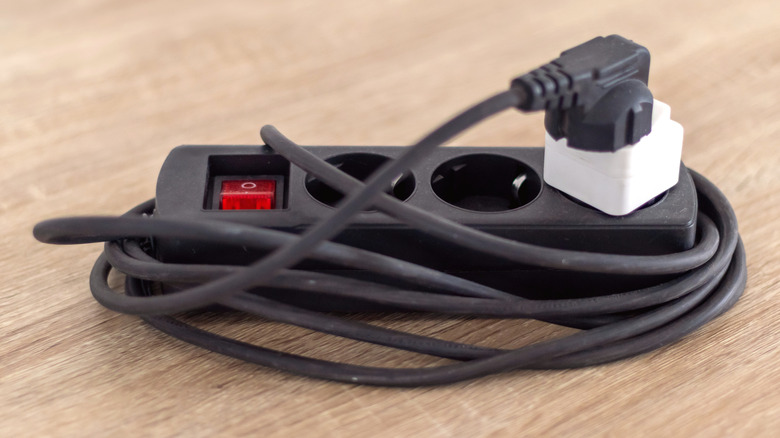 Used extension cord on table