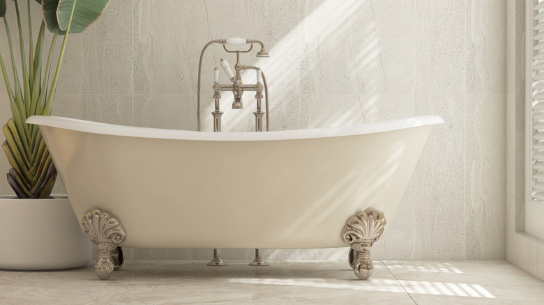 A bathroom with a clawfoot tub.