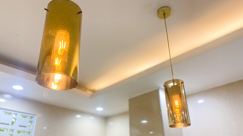 bathroom with hanging pendant lights