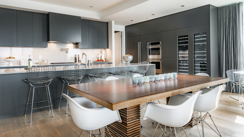 Dark grey kitchen cabinets with white countertops