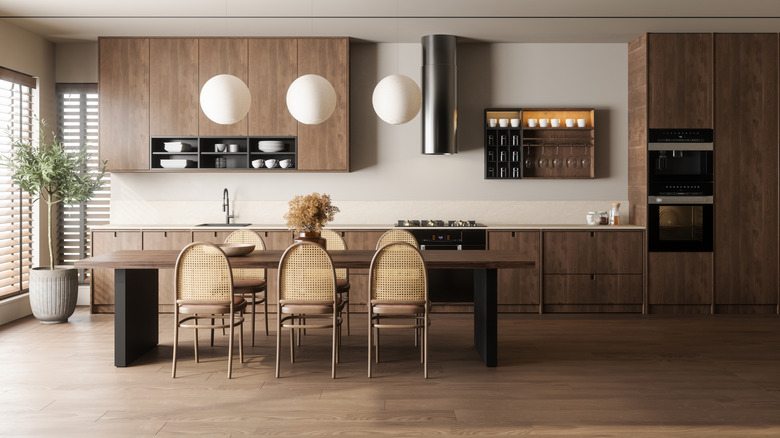 Kitchen with brown cabinets and Japandi inspired design and furniture