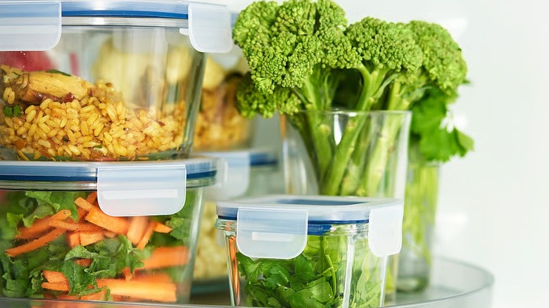 Glass food containers filled with different items for meal prep