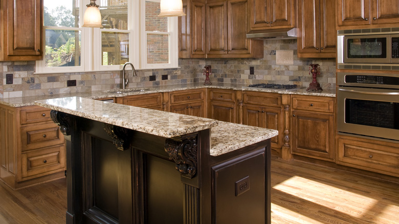 Tiered island in the middle of a kitchen
