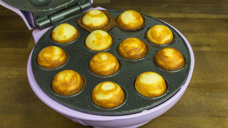 cake pop maker on wooden table