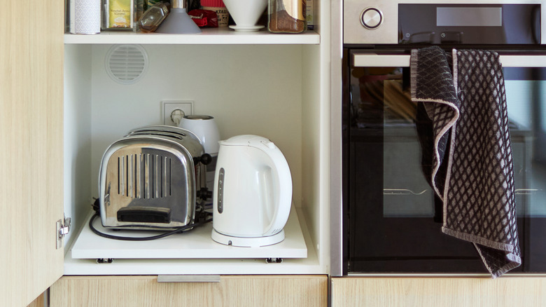 A close up on an appliance garage and oven.
