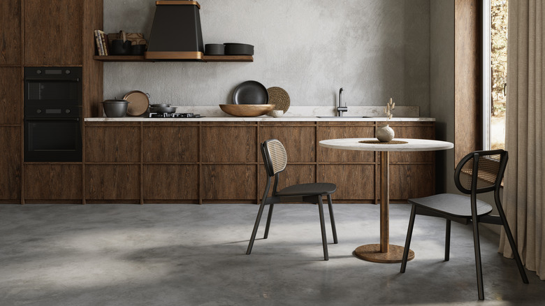 An organic modern kitchen with stone floors.