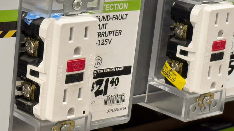 GFCI ground fault circuit interruption outlet on display inside a home improvement store