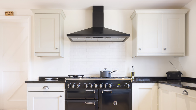 Vent above stove in modern kitchen