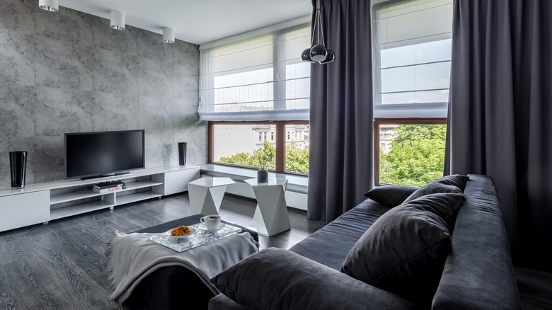 A monochromatic gray modern living room.