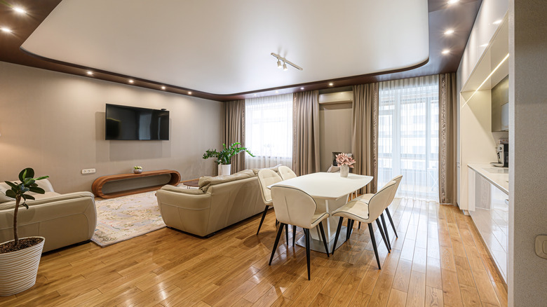 A modern living room with beige walls.
