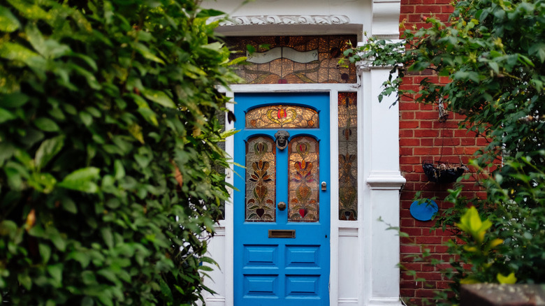 Front door with stained glass windows