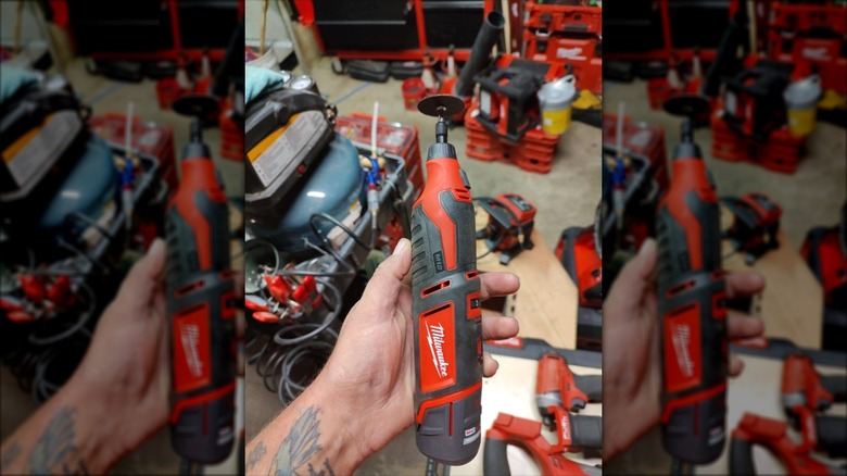 Close-up of a hand holding up Milwaukee's M12 Lithium-Ion Cordless Rotary Tool