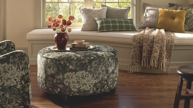 Upholstered ottoman in a living room