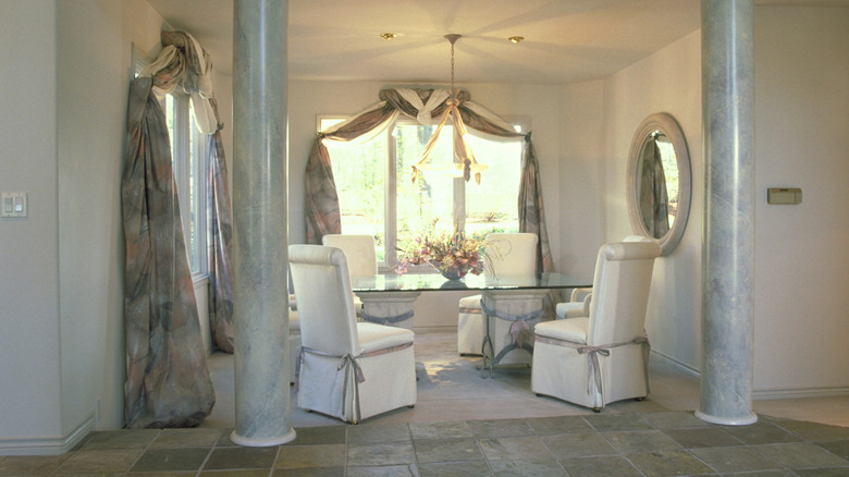 A pastel dining area with watercolor style pillars
