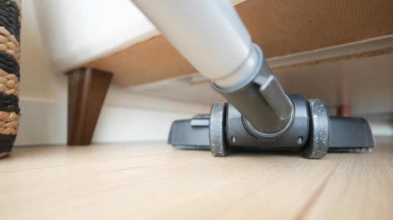 Vacuum going underneath a couch