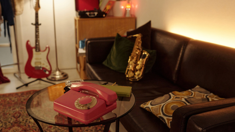 Eclectic living room home decor with instruments and cozy lighting