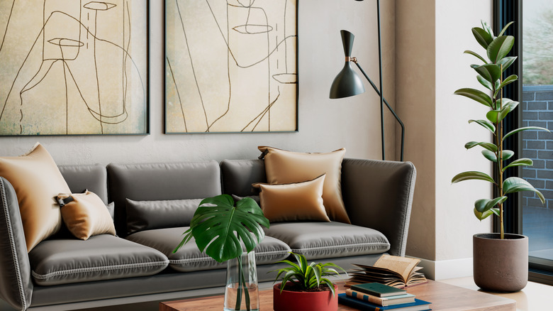 Modern living room with curvy lines and sketch art